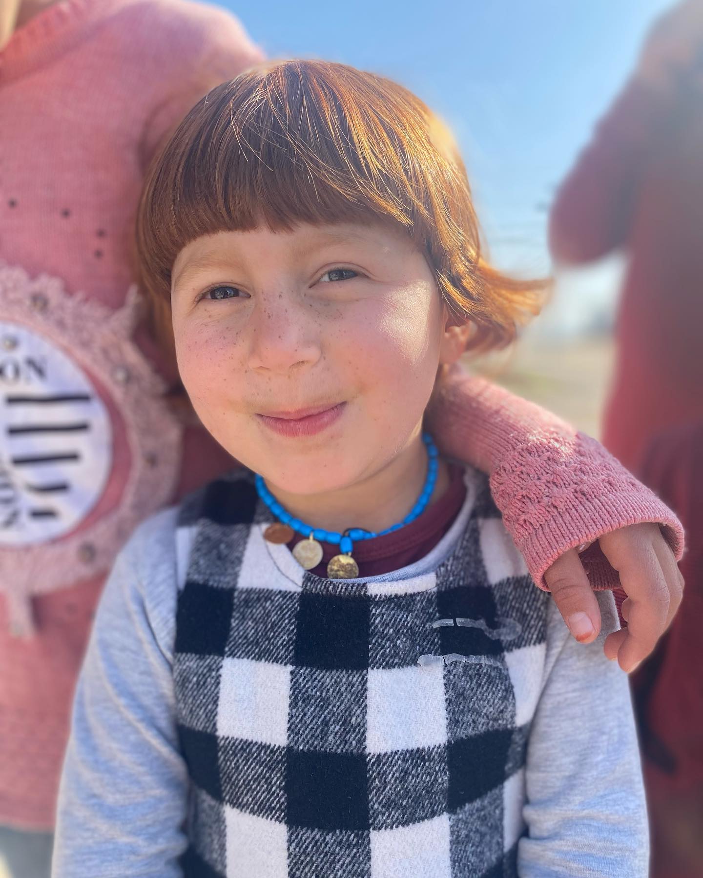 Child supported by community